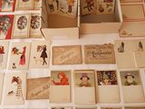a lot of cards on the table with pictures on them