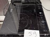 an image of a stove top with a sticker on it