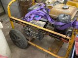 a yellow cart with tools on it in a garage