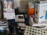 a pile of assorted items sitting on the floor