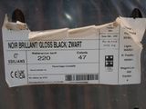 a picture of a close up of a ticket on a trash can