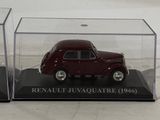 a small red car in a clear display case