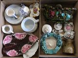 a box full of assorted items sitting on the floor