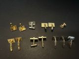 a close up of a bunch of different metal items on a table