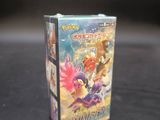a box of pokemon trading cards sitting on a table