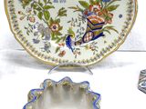 several different types of decorative items are displayed on a white surface