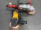 a picture of a corded sander and a grinder on the ground