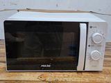 a microwave that is sitting on a wooden table