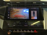 a picture of a car dashboard with a camera mounted on it