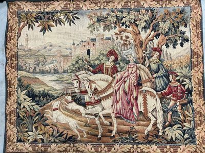 a tapestry with a picture of a man riding a horse and a dog