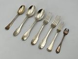 a set of six silverplated forks and spoons
