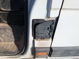 a close up of a door handle on a truck