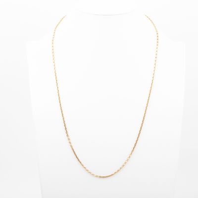 un collier à chaîne en or sur un mannequin mannequin mannequin mannequin mannequin mannequin mannequin mannequin mannequin mannequin