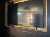 a large flat screen tv mounted on the wall