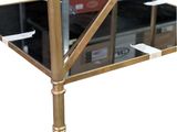a glass table with a gold metal frame and glass top