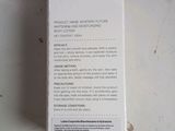 a close up of a box on a table with a label on it
