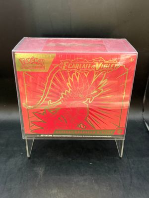 a close up of a red box with a dragon on it