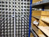 a room with shelves and shelves with many different types of tools