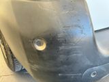 a close up of the front bumper of a car