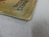 a book that is laying on a bed