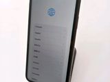 a phone that is sitting on top of a stand