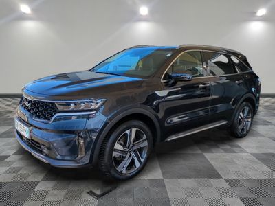 a blue 2020 kia kole suv parked in a showroom