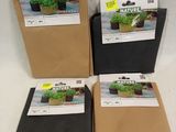a group of three bags of plants sitting on top of a table