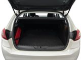 the back of a white car with its trunk open on a white background