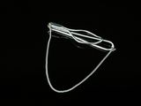 silver plated hair clip with a chain on a black background