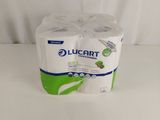 two rolls of toilet paper sitting on top of a white table