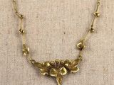 a close up of a necklace on a mannequin mannequin mannequin mannequin mannequin mannequin mannequin mannequin