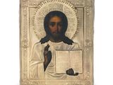 une image représentant une icône religieuse de Jésus tenant un livre