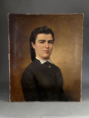 portrait of a woman in a black dress and white collared shirt