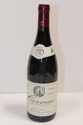 a bottle of wine that is sitting on a table