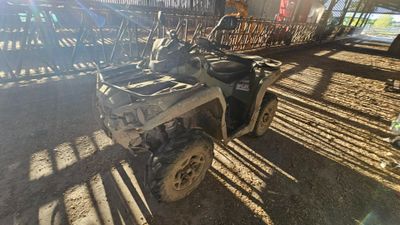 a motorcycle that is parked in the dirt