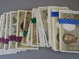 a pile of money sitting on top of a table