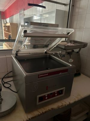 a machine that is sitting on a counter in a kitchen