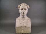 marble bust of a man with a beard on a gray background
