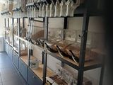 a room with shelves filled with various types of food