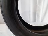 a close up of a tire tire on a white surface