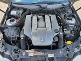 the engine compartment of a car with its hood open