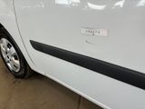 a white car with a sticker on the side of it
