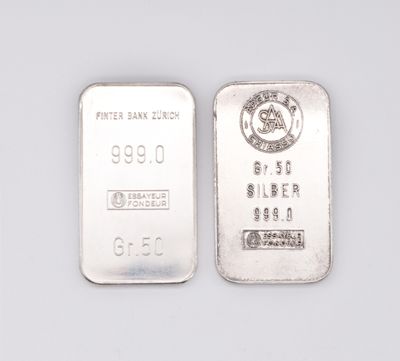 two silver bars are shown side by side on a white surface