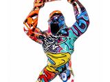 a statue of a man holding a skateboard in his hands