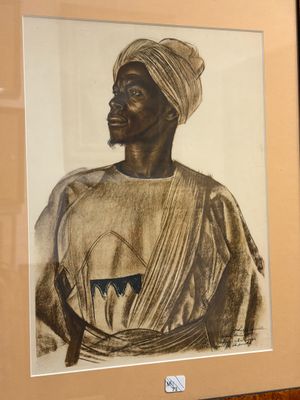 tableau représentant un homme coiffé d'un turban, dans un cadre