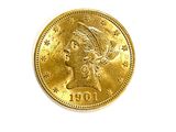 an image of a gold coin with a woman ' s head on it