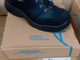 a pair of shoes that are on top of a box