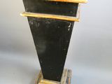 a statue of a lion on top of a pedestal