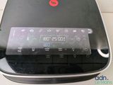 a close up of a clock on the side of a printer