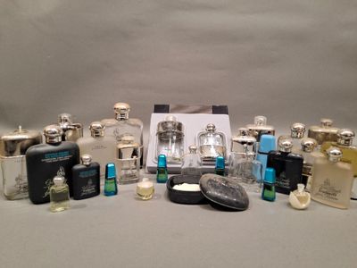 many different types of perfumes and bottles on the table